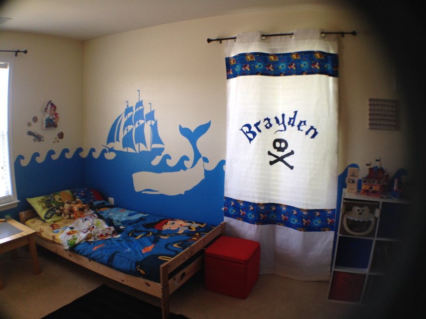 Finished curtain and mural with whale and ship